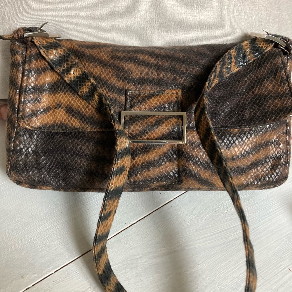 Animal print Tianni purse.